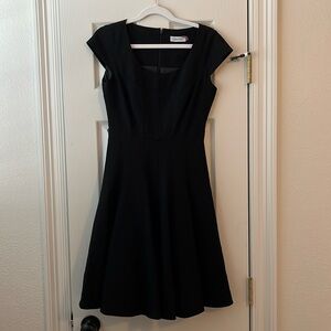 Size 2 Black Calvin Klein Classy, Feminine, Classic Cap Sleeve A-Line Midi Dress
